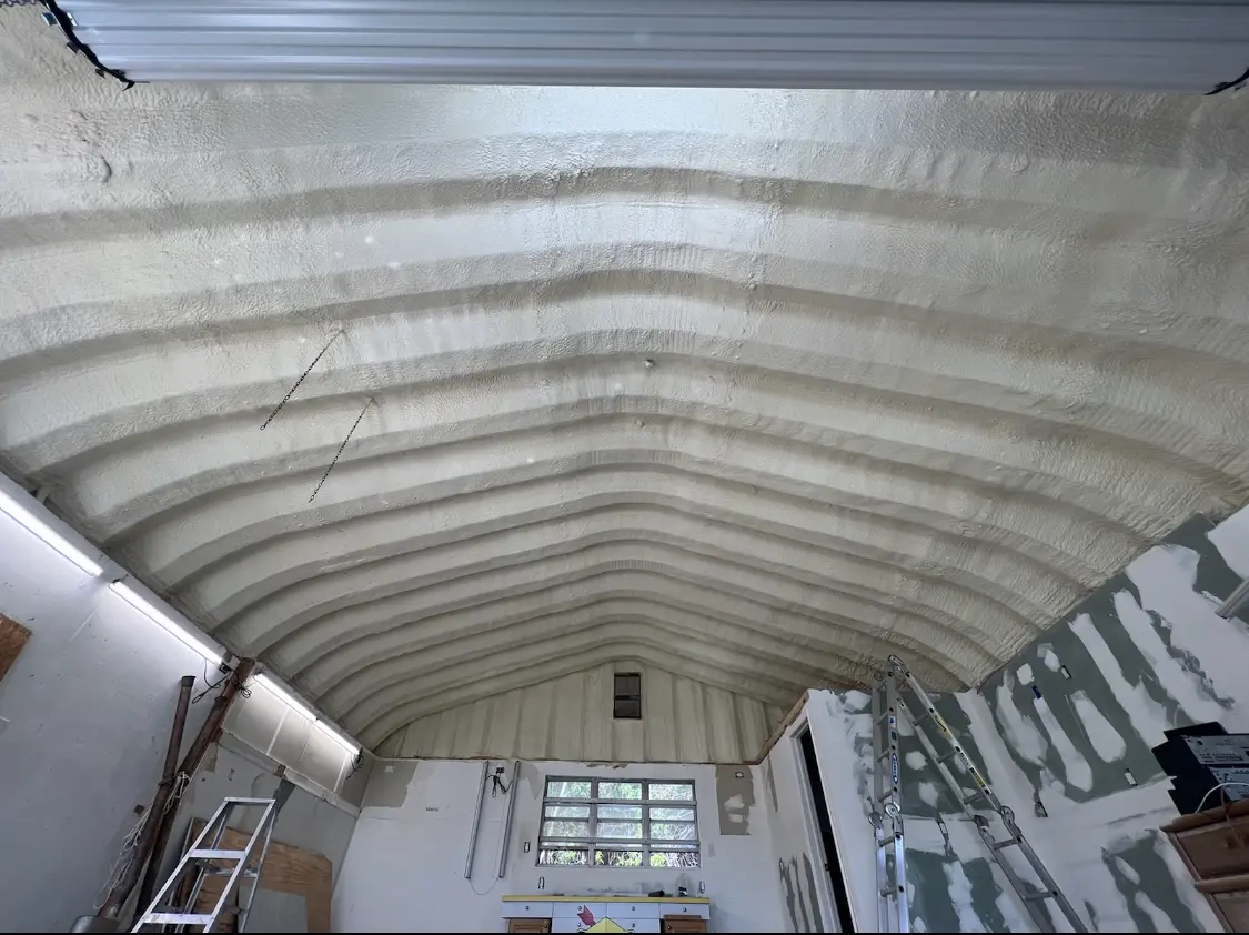 Spray polyurethane foam applied to the underside of a metal roof deck in Leavenworth